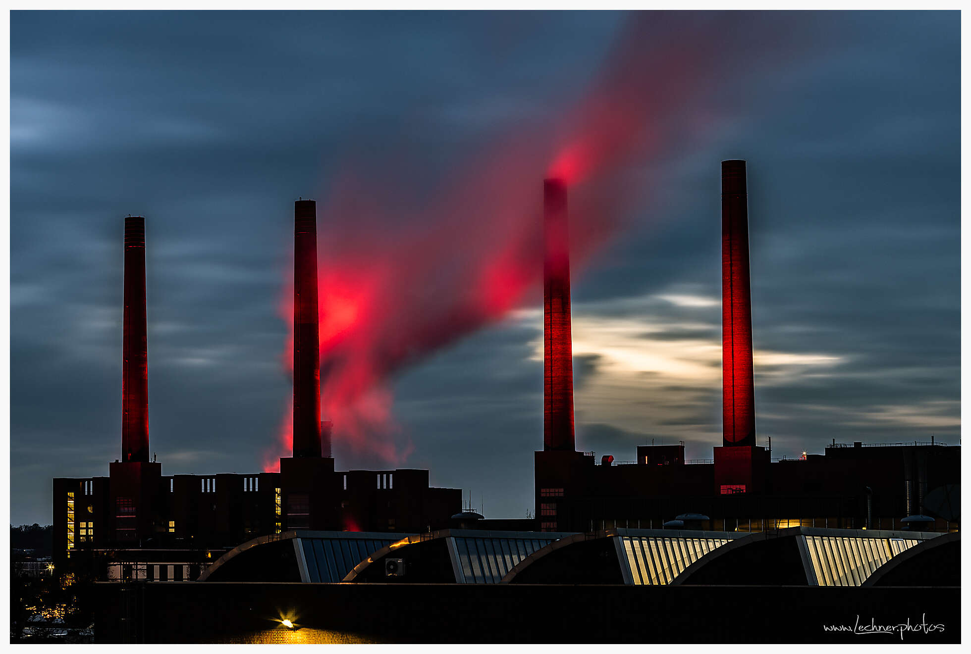 Towers of the Wolfsburg VW power plant lit up for christmas