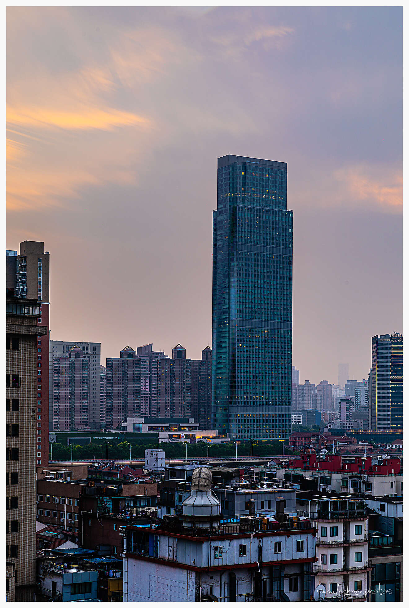 sun setting over Shanghai